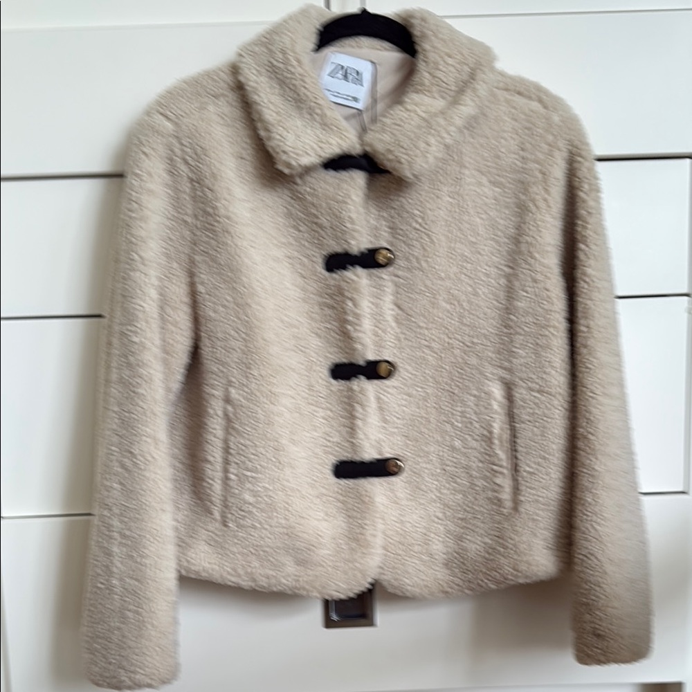 Cozy Cream Jacket with Toggle Closures